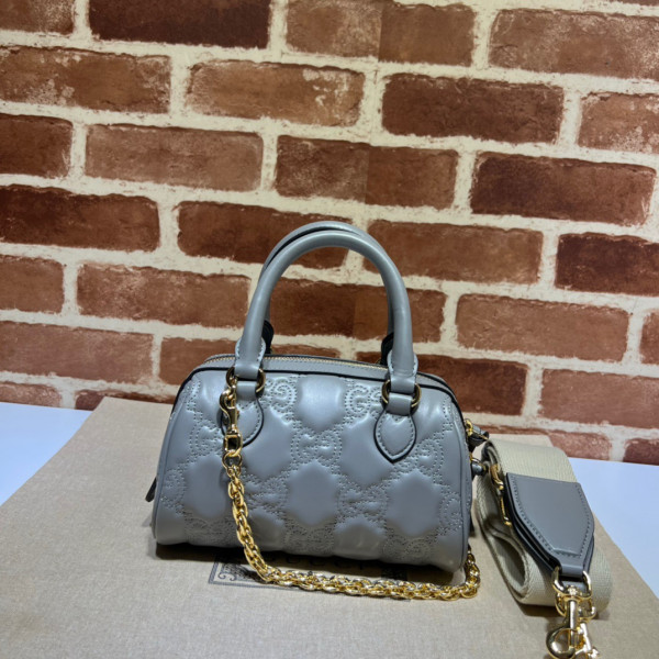 G*u*i gg matelassé leather top handle bag