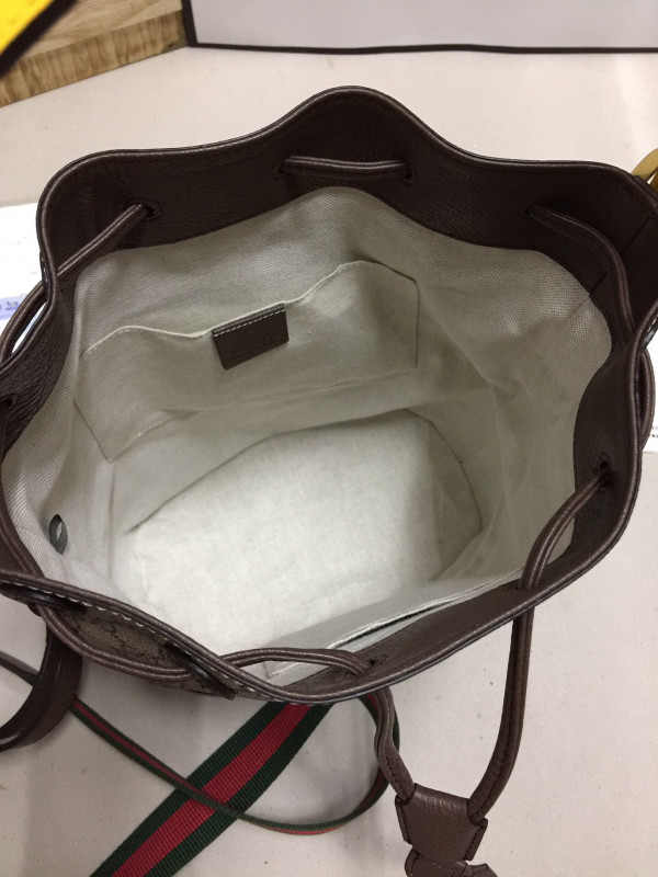 G*u*i bucket bag