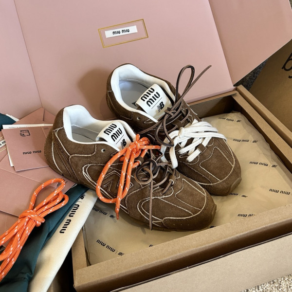 M*um*u x new balance sneaker