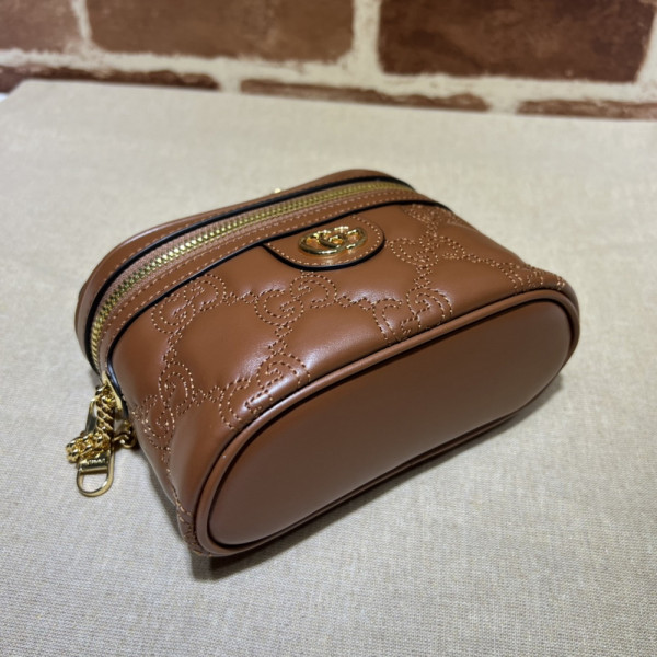 G*u*i gg matelassé top handle mini bag