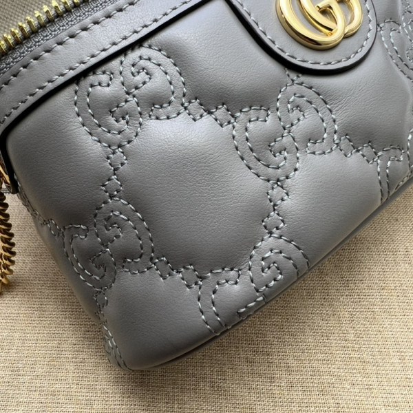 G*u*i gg matelassé top handle mini bag