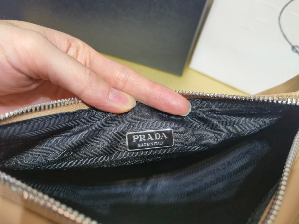 Pra*a triangle bag