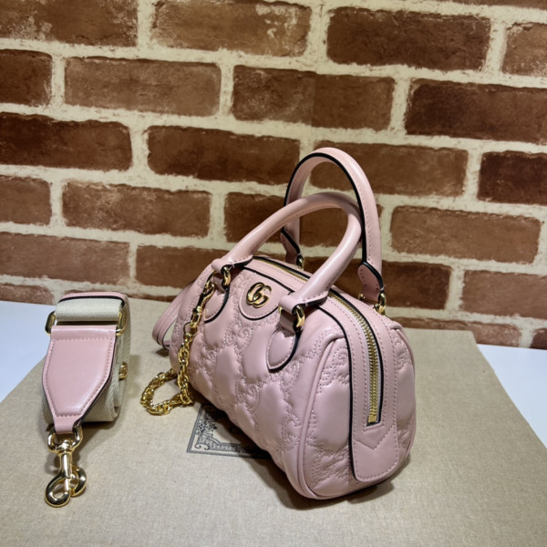 G*u*i gg matelassé leather top handle bag