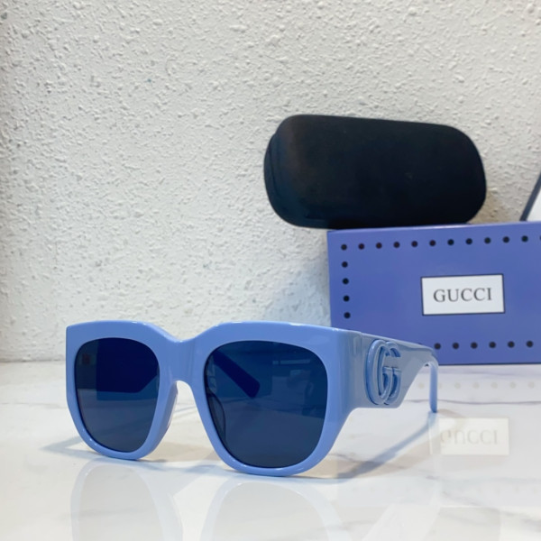 G*u*i sunglasses