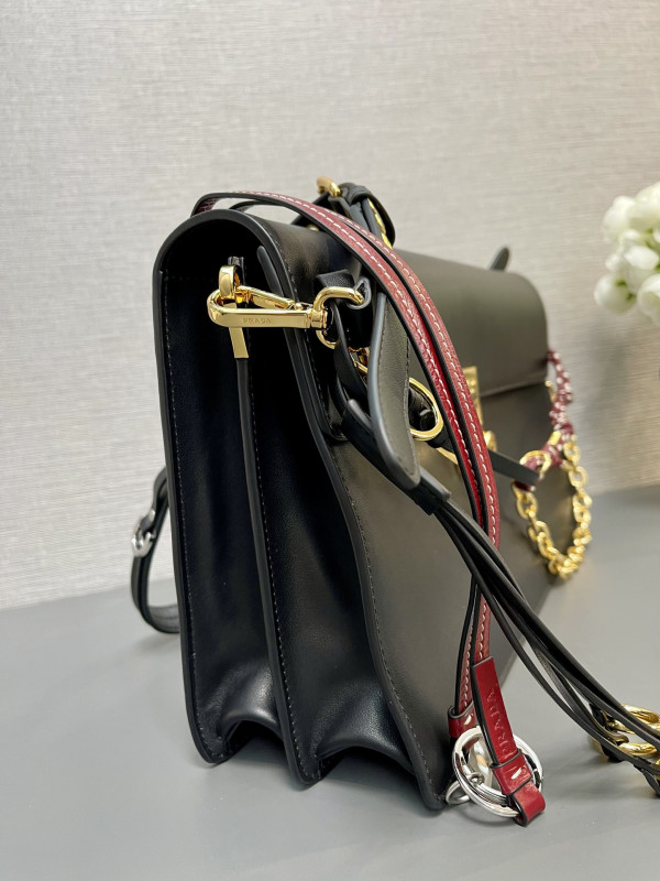 Pra*a soft sound large leather shoulder bag with charms